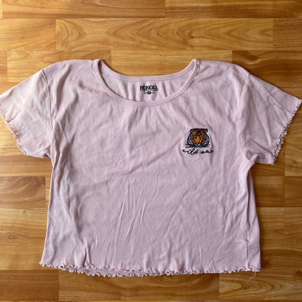 pink “wild ones” crop tee w/ ruffle edges